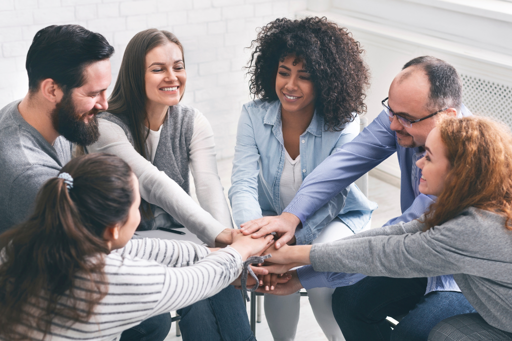 A supportive group session where a therapist offers comfort to a patient during dual diagnosis treatment in Thousand Oaks, CA. The focus is on empathy, support, and recovery.