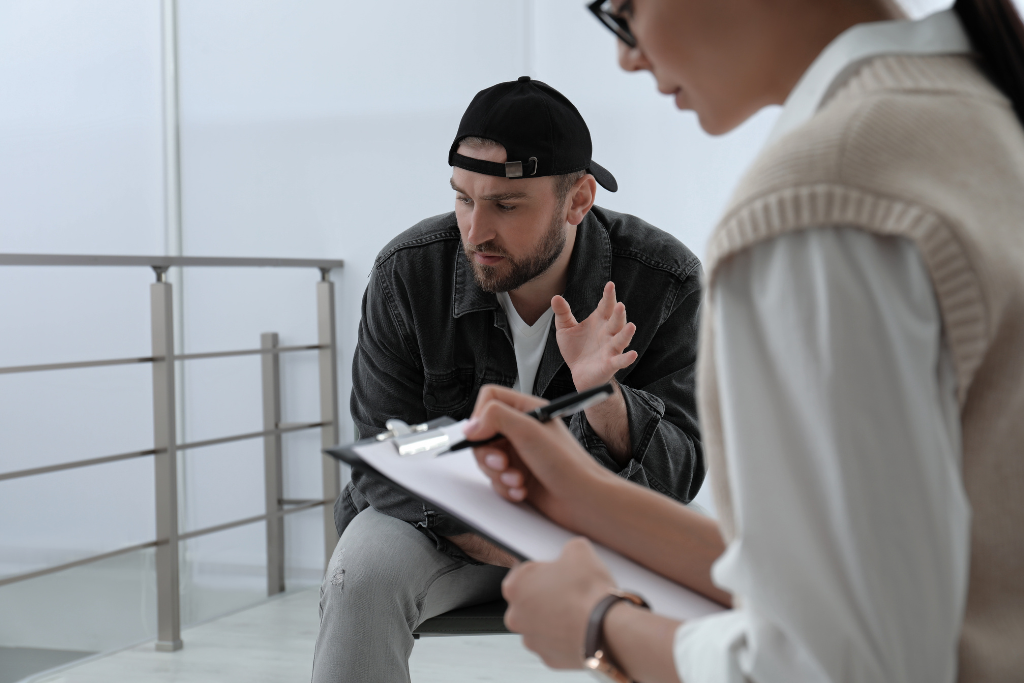 Man discussing recovery during a one-on-one counseling session at a drug rehab in Thousand Oaks, CA.